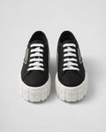 Prada Black Platform Low-Top Sneakers with Triangle Logo and White Lug Sole - photo 1