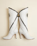 White Knee-High Stiletto Heeled Boots with Sunburst Appliqués and Embossed Trim - photo 1
