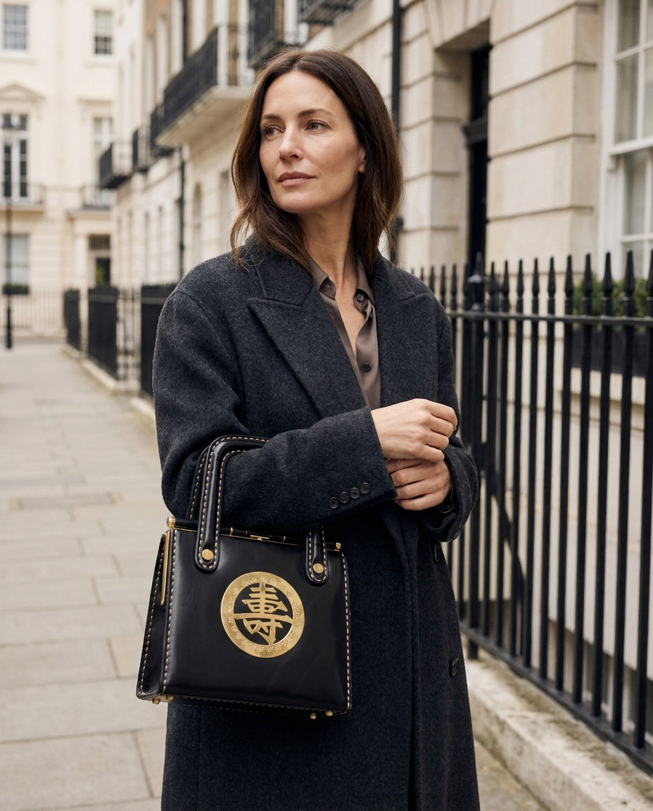 Black Structured Box Handbag with Brass Kanji Medallion and Gold Whipstitching - photo 5