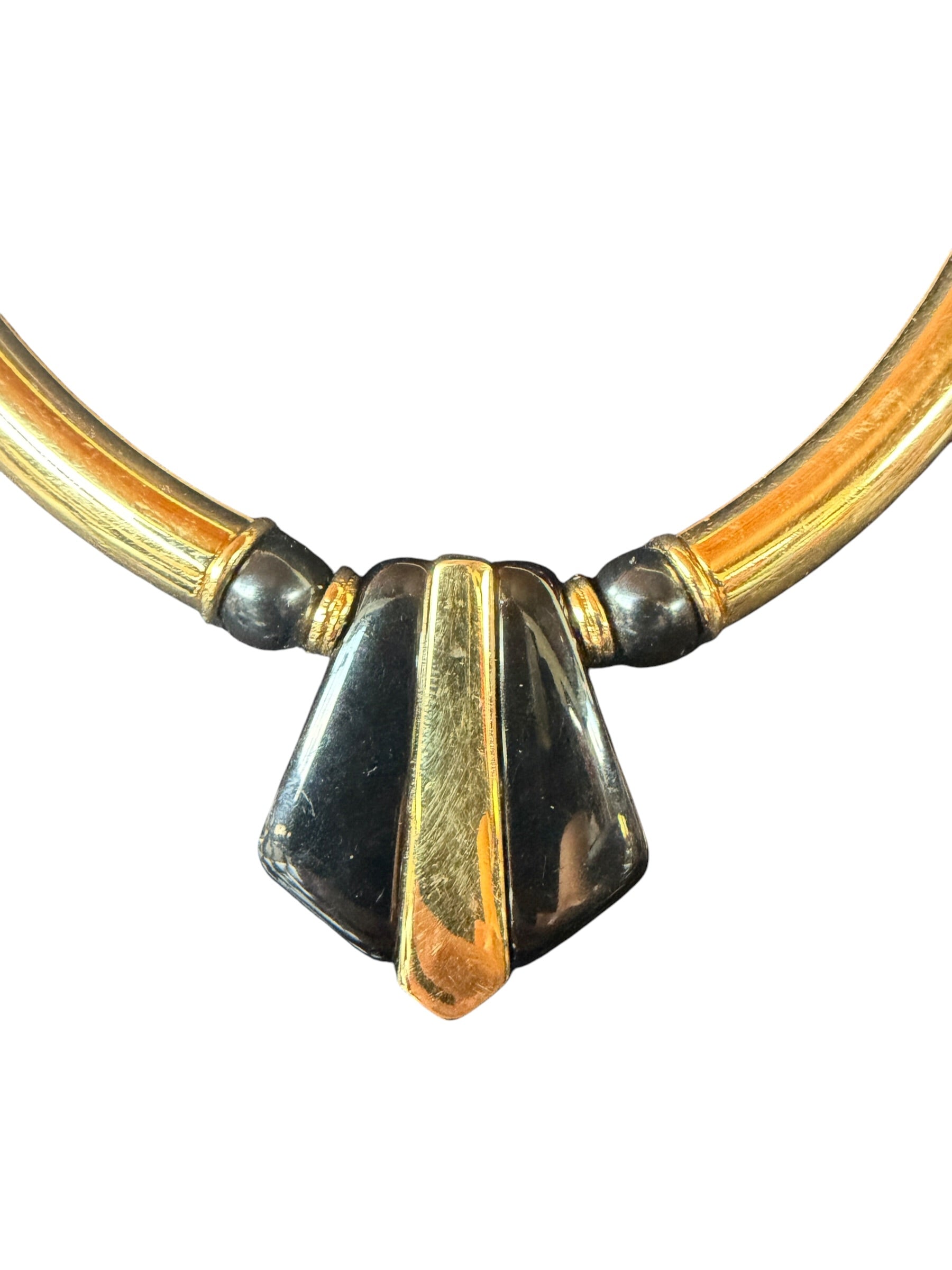 Gold-Colored Metal Necklace with Triangular Pendant and Decorative Beads