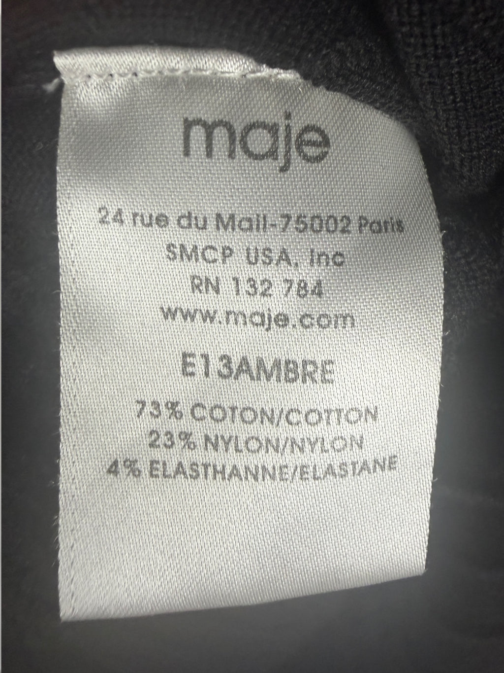 Maje Black Ribbed Knit Dress with Ruched Bodice and Flared Skirt