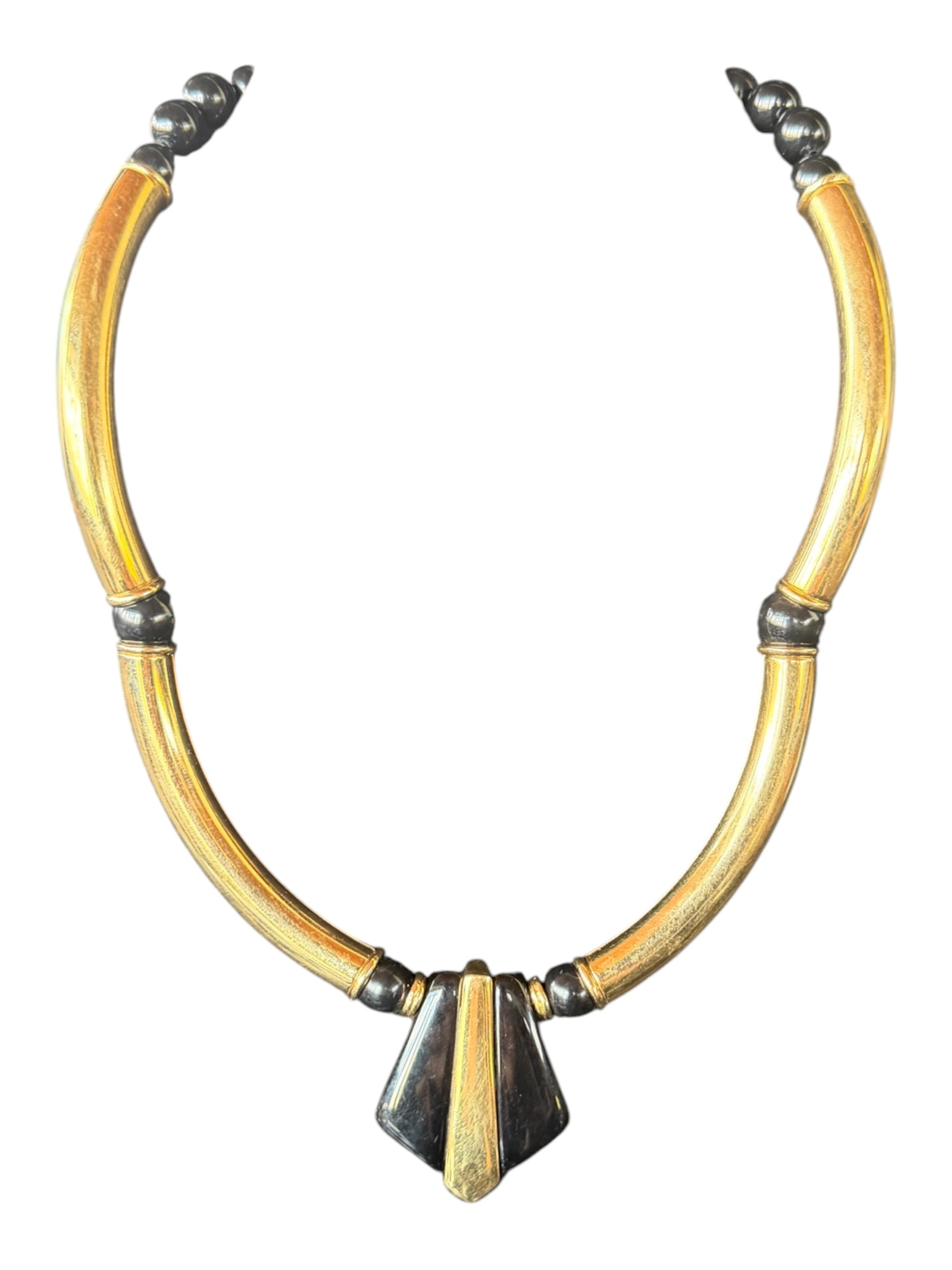 Gold-Colored Metal Necklace with Triangular Pendant and Decorative Beads