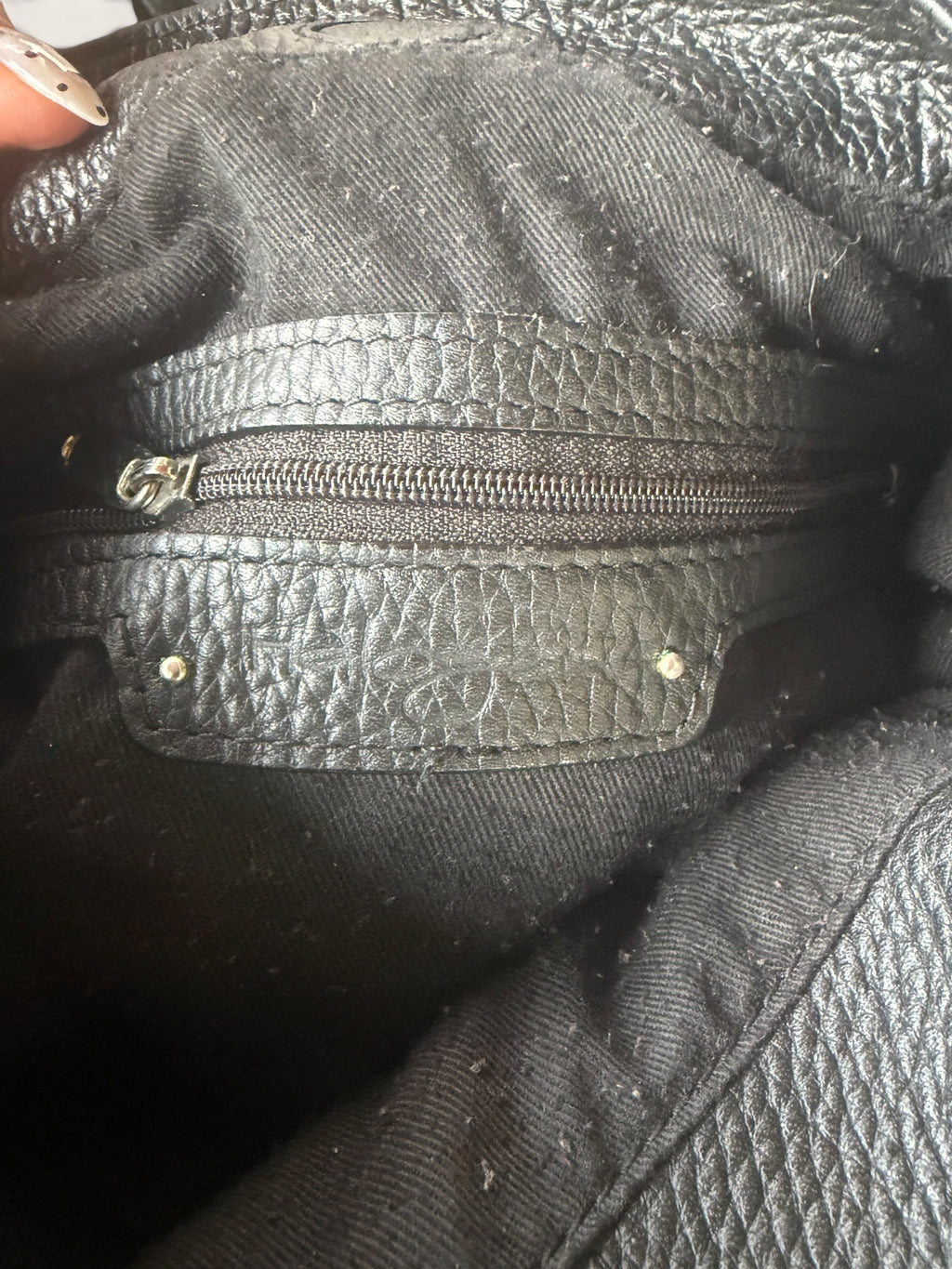 Black Leather Hobo Bag with Braided Handle and Tassel Detail