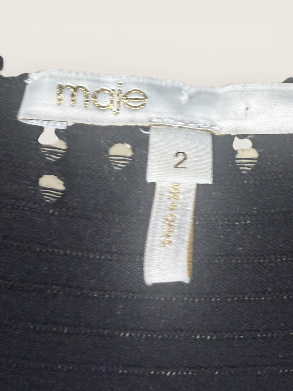 Maje Black Ribbed Knit Dress with Ruched Bodice and Flared Skirt