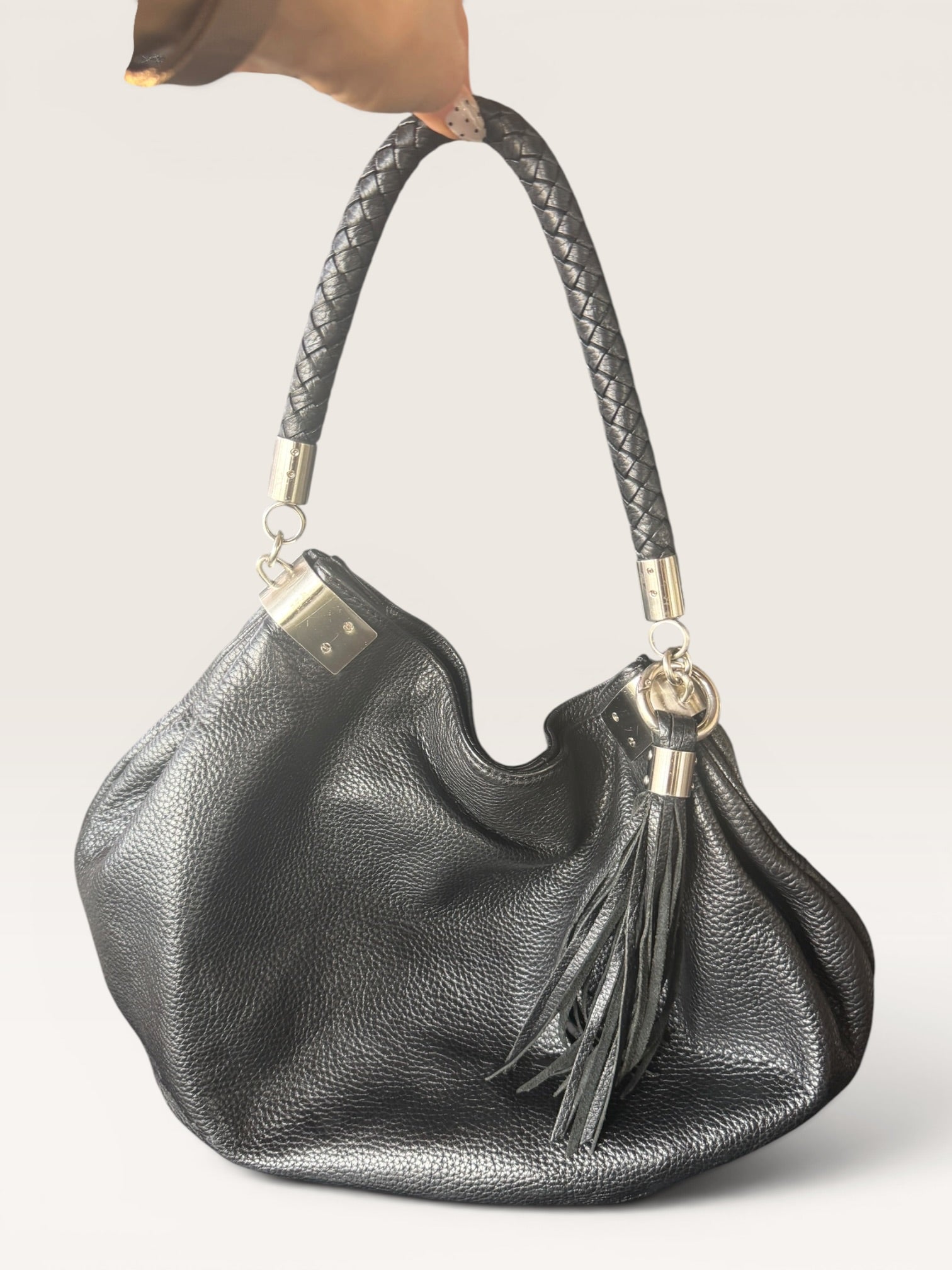 Black Leather Hobo Bag with Braided Handle and Tassel Detail